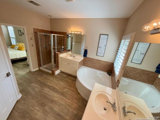 Bathroom, Dual Sink Vanities, Glass Shower, Interior, Wood Texture Flooring