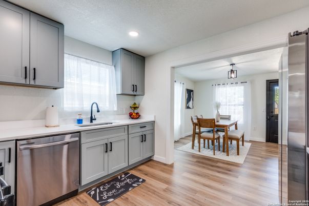 Dining room, Interior, Kitchen, Recessed Lighting, Stainless Steel Appliances, Wood Texture Flooring
