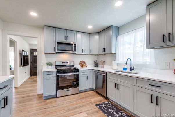 Interior, Kitchen, Recessed Lighting, Stainless Steel Appliances, Wood Texture Flooring