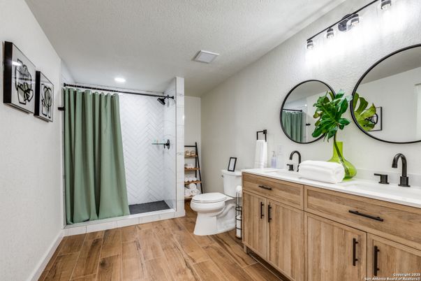 Bathroom, Dual Sink Vanities, Interior, Recessed Lighting, Wood Texture Flooring