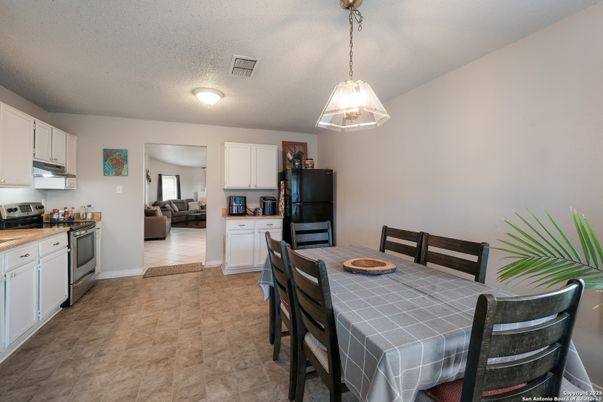 Dining room, Interior, Kitchen, Living room, Pendant Lights, Tile Countertops