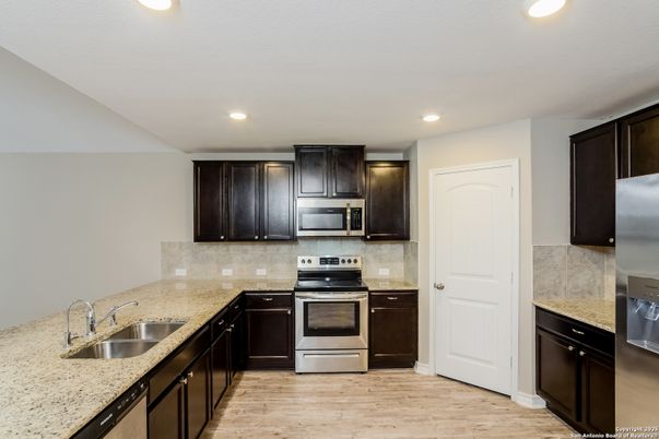 Interior, Kitchen, Recessed Lighting, Stainless Steel Appliances, Wood Texture Flooring