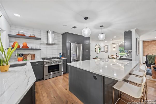 Interior, Kitchen, Pendant Lights, Recessed Lighting, Stainless Steel Appliances, Wood Texture Flooring