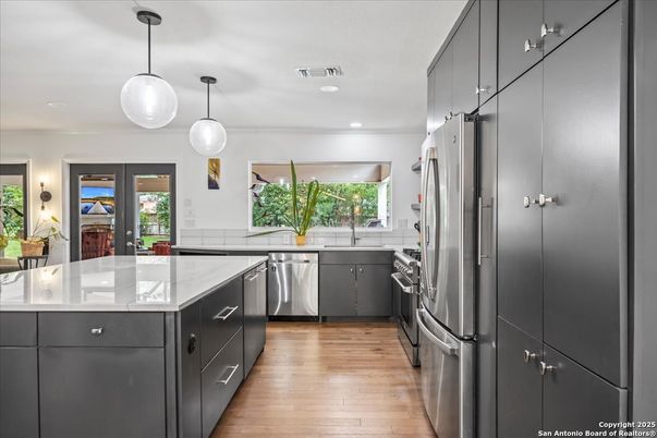 Interior, Kitchen, Pendant Lights, Recessed Lighting, Stainless Steel Appliances, Wood Texture Flooring
