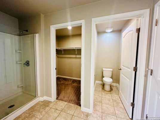 Bathroom, Glass Shower, Interior, Recessed Lighting, Walk-in Closets, Wood Texture Flooring