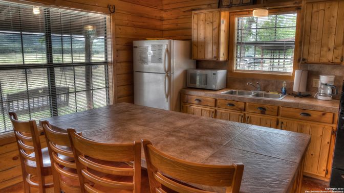 Interior, Kitchen, Tile Countertops, Wooden Walls