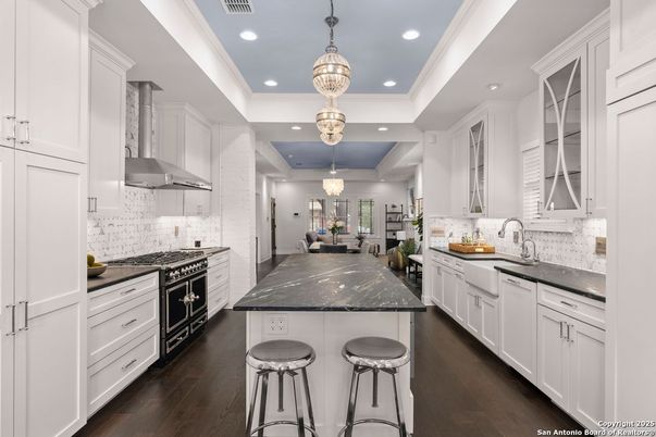 Chandelier, Interior, Kitchen, Pendant Lights, Recessed Lighting, Stainless Steel Appliances, Wood Texture Flooring