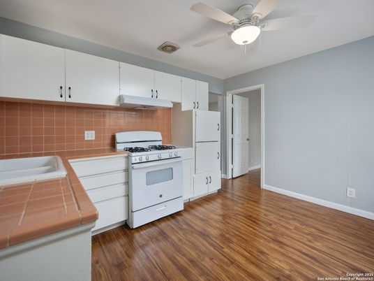 Interior, Kitchen, Tile Countertops, Wood Texture Flooring