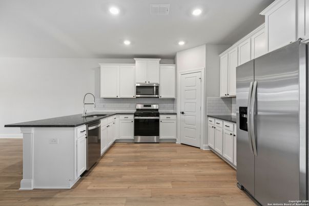 Interior, Kitchen, Recessed Lighting, Stainless Steel Appliances, Wood Texture Flooring
