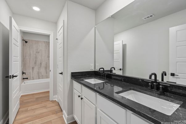 Bathroom, Dual Sink Vanities, Interior, Recessed Lighting, Wood Texture Flooring