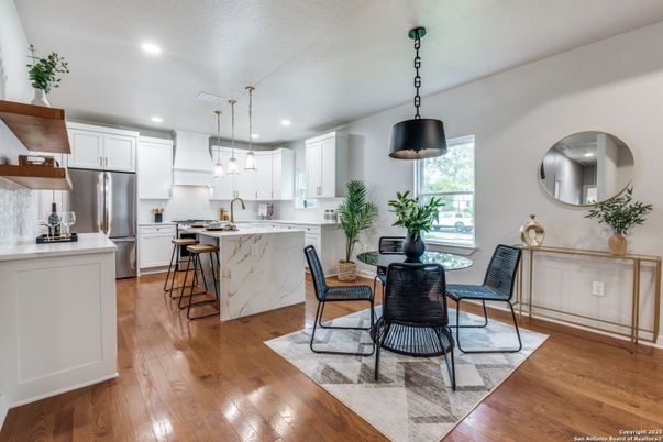 Dining room, Interior, Kitchen, Pendant Lights, Recessed Lighting, Stainless Steel Appliances, Wood Texture Flooring