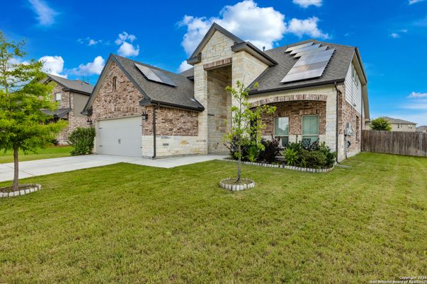 Attached, Backyard, Exterior, Facade, Brick Facade, Solar Panels, Brick Traditional