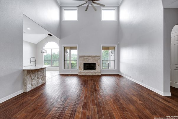 Empty room, Fireplace, Interior, Pendant Lights, Recessed Lighting, Wood Texture Flooring