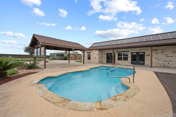 Exterior, Pool, Solar Panels