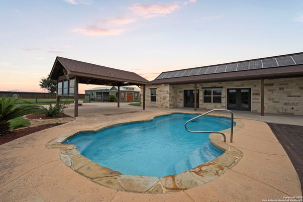 Exterior, Pool, Solar Panels