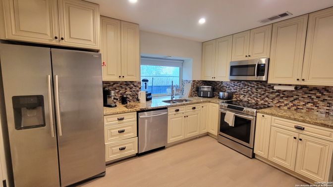 Interior, Kitchen, Recessed Lighting, Stainless Steel Appliances, Wood Texture Flooring
