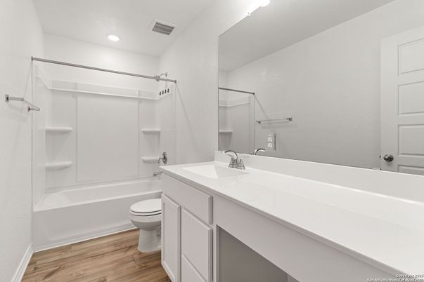 Bathroom, Dual Sink Vanities, Interior, Recessed Lighting, Walk-in Closets, Wood Texture Flooring