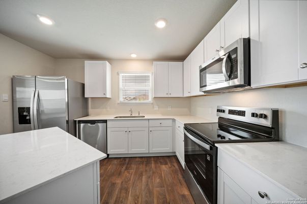 Interior, Kitchen, Recessed Lighting, Stainless Steel Appliances, Wood Texture Flooring