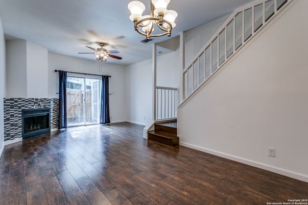 Chandelier, Empty room, Fireplace, Interior, Wood Texture Flooring