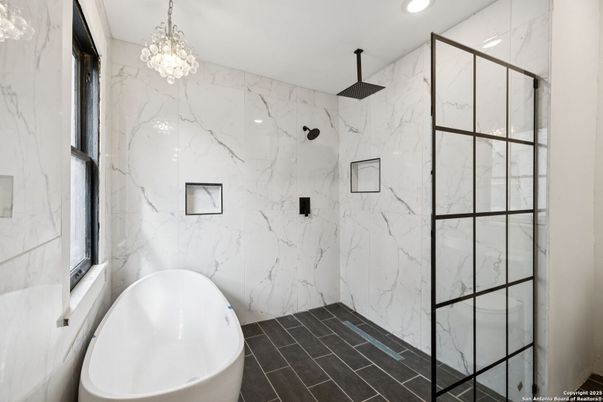 Bathroom, Chandelier, Free Standing Baths, Glass Shower, Interior, Marble Walls, Recessed Lighting