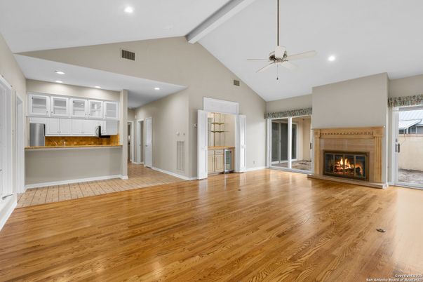 Empty room, Fireplace, Interior, Kitchen, Recessed Lighting, Wood Texture Flooring
