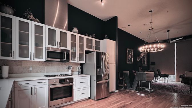 Chandelier, Dining room, Interior, Kitchen, Pendant Lights, Stainless Steel Appliances, Wood Texture Flooring