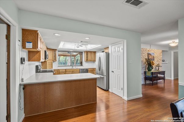 Interior, Kitchen, Recessed Lighting, Stone Walls, Wood Texture Flooring