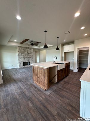 Fireplace, Interior, Kitchen, Pendant Lights, Recessed Lighting, Stone Walls, Wood Texture Flooring