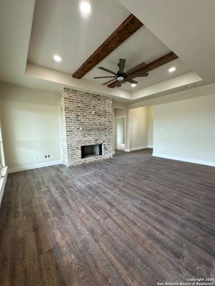 Empty room, Fireplace, Interior, Recessed Lighting, Stone Walls, Wooden Beams, Wood Texture Flooring