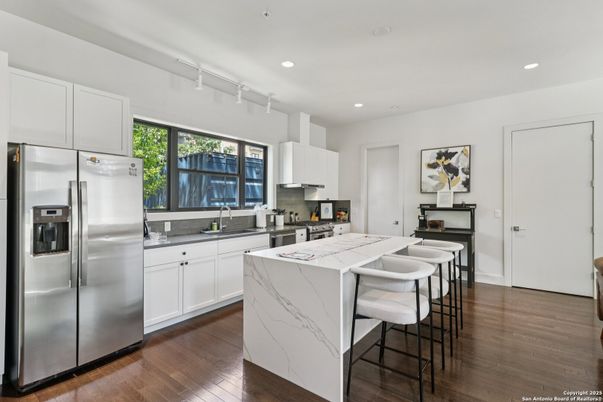 Interior, Kitchen, Recessed Lighting, Stainless Steel Appliances, Wood Texture Flooring