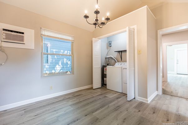 Chandelier, Interior, Utility Closets, Washer, Wood Texture Flooring
