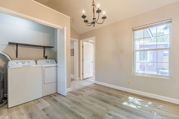 Chandelier, Interior, Utility Closets, Washer, Wood Texture Flooring