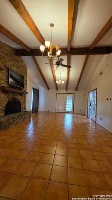 Chandelier, Empty room, Fireplace, Interior, Stone Walls, Wooden Beams