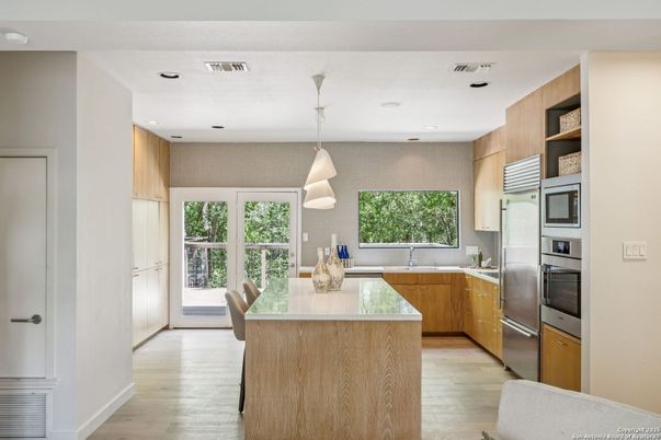 Interior, Kitchen, Pendant Lights, Recessed Lighting, Stainless Steel Appliances, Wood Texture Flooring
