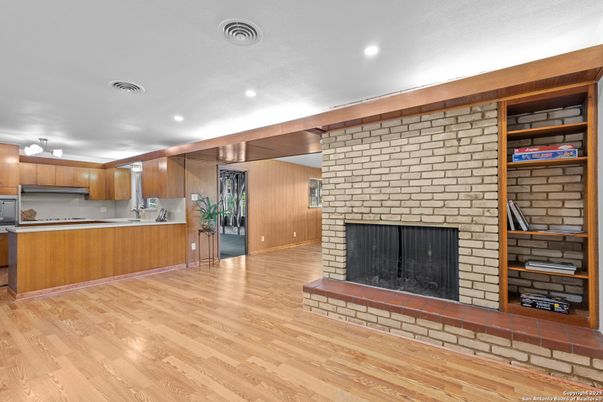Fireplace, Interior, Kitchen, Recessed Lighting, Stone Walls, Wood Texture Flooring, Wooden Walls