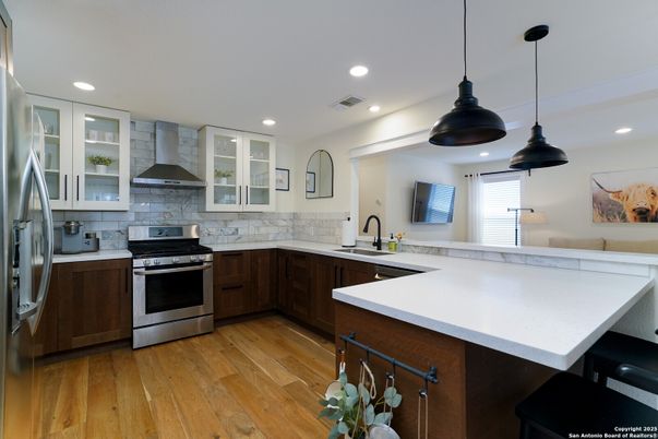 Interior, Kitchen, Pendant Lights, Recessed Lighting, Stainless Steel Appliances, Wood Texture Flooring