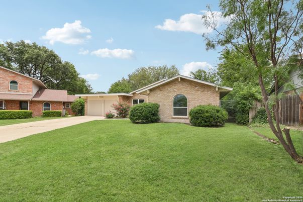 Attached, Backyard, Exterior, Facade, Brick Facade, Ranch