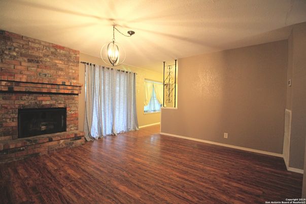 Empty room, Fireplace, Interior, Pendant Lights, Wood Texture Flooring