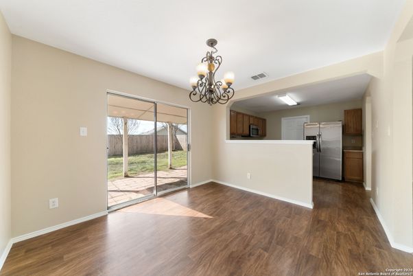 Chandelier, Empty room, Interior, Kitchen, Stainless Steel Appliances, Wood Texture Flooring