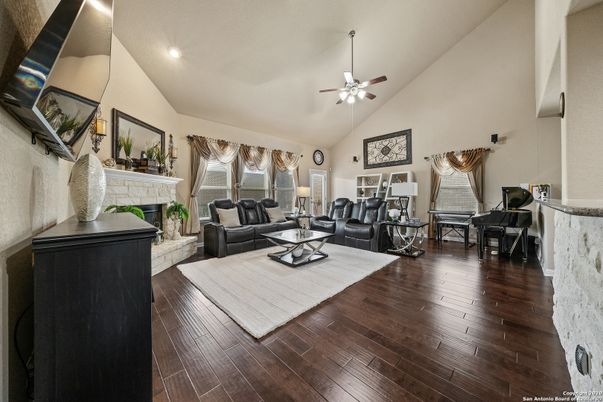 Dining room, Fireplace, Interior, Living room, Recessed Lighting, Wood Texture Flooring