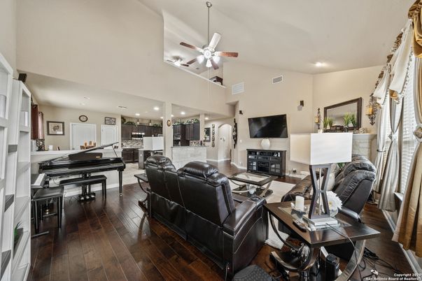 Fireplace, Interior, Piano, Recessed Lighting, Wood Texture Flooring