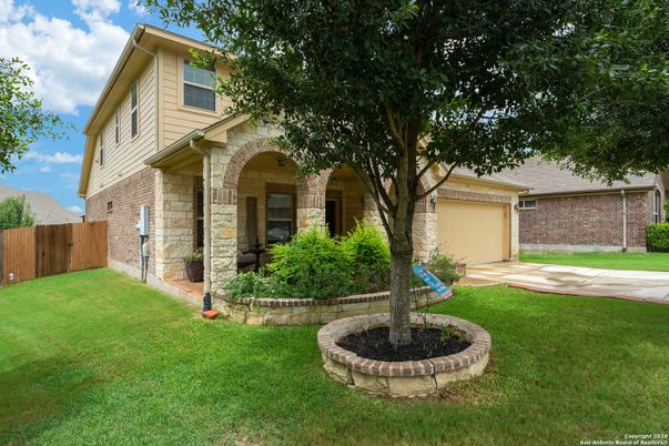 Attached, Backyard, Exterior, Facade, Brick Facade, Mediterranean