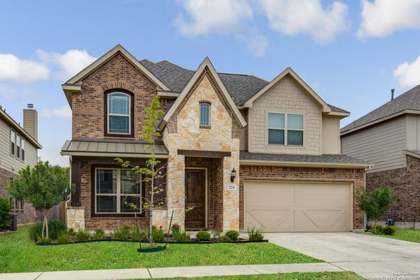 Attached, Exterior, Facade, Brick Facade, Brick Traditional