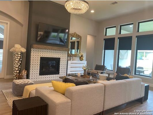 Chandelier, Fireplace, Interior, Living room, Recessed Lighting, Wood Texture Flooring