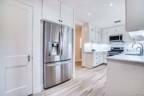 Interior, Kitchen, Recessed Lighting, Stainless Steel Appliances, Wood Texture Flooring