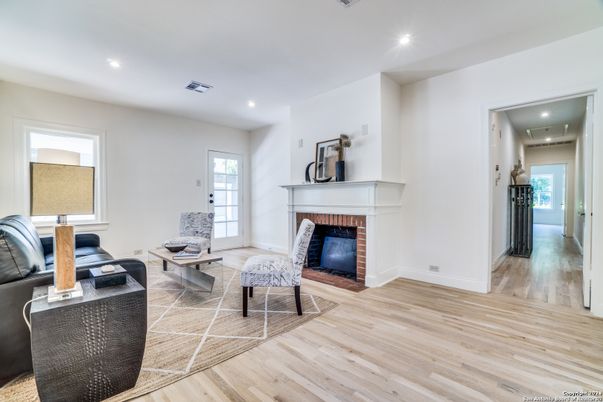 Fireplace, Interior, Living room, Recessed Lighting, Wood Texture Flooring