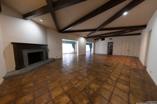 Empty room, Fireplace, Interior, Recessed Lighting, Wooden Beams