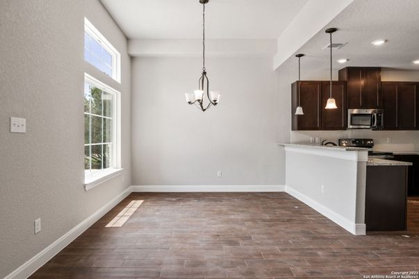 Chandelier, Empty room, Interior, Kitchen, Pendant Lights, Recessed Lighting, Wood Texture Flooring