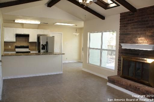 Fireplace, Interior, Kitchen, Pendant Lights, Stainless Steel Appliances, Wooden Beams, Wooden Walls
