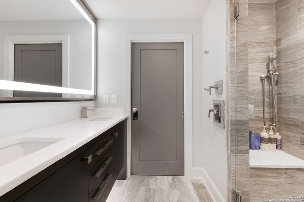 Bathroom, Dual Sink Vanities, Glass Shower, Interior, Wood Texture Flooring